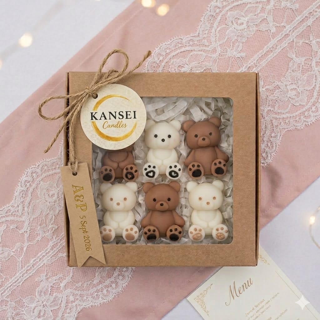 Caja kraft con seis mini velas de ositos en tonos crema y chocolate